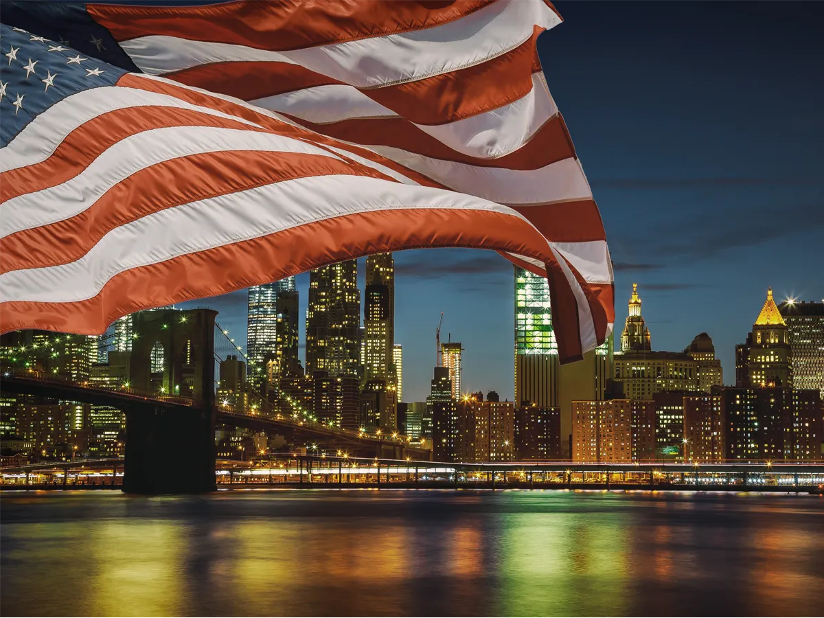 Brightly lit American city at night showcasing urban life – interesting facts about United States