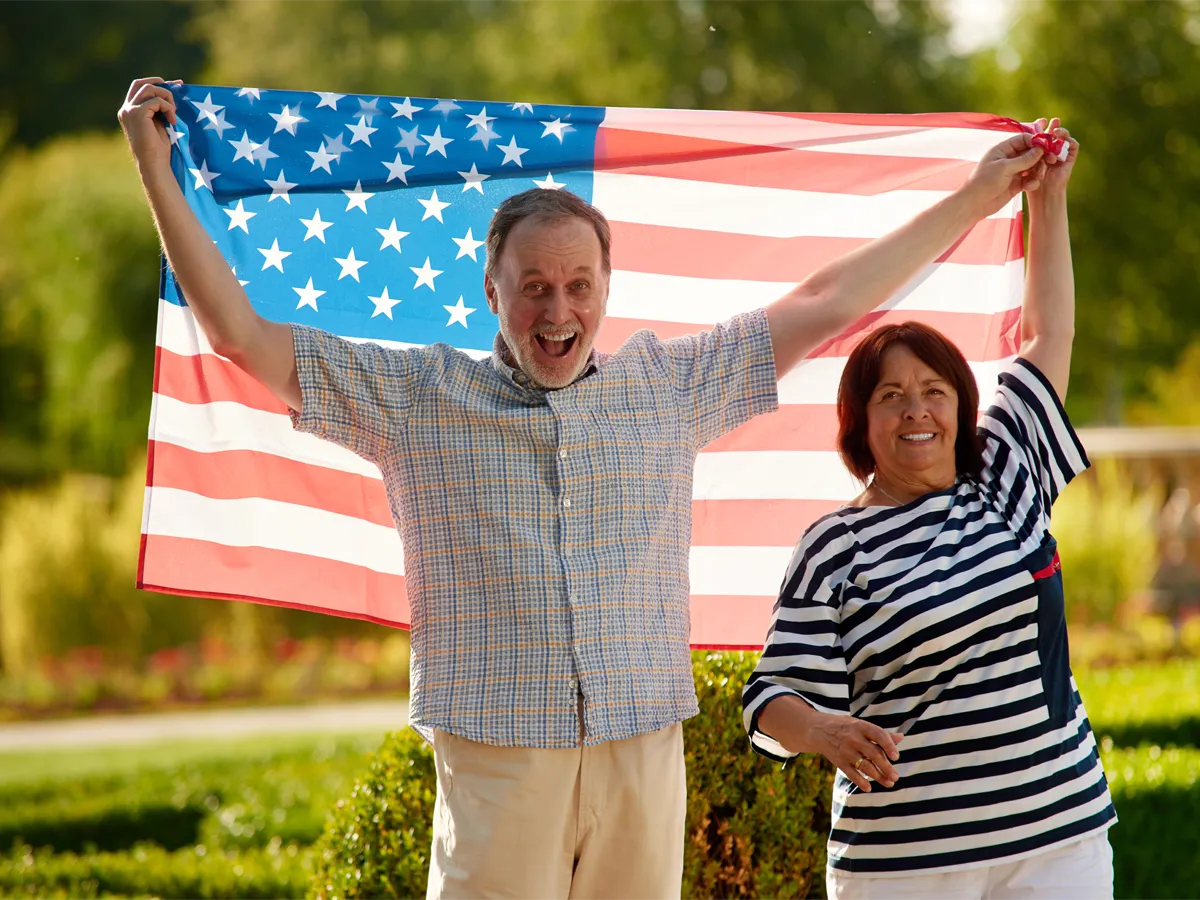 Happy couple celebrating after gaining U.S. citizenship – how long does it take to get citizenship after marriage