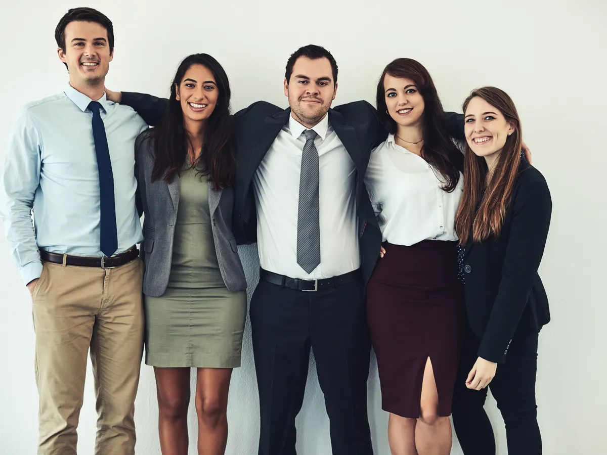 Group of US citizenship applicants wearing formal suits for the interview