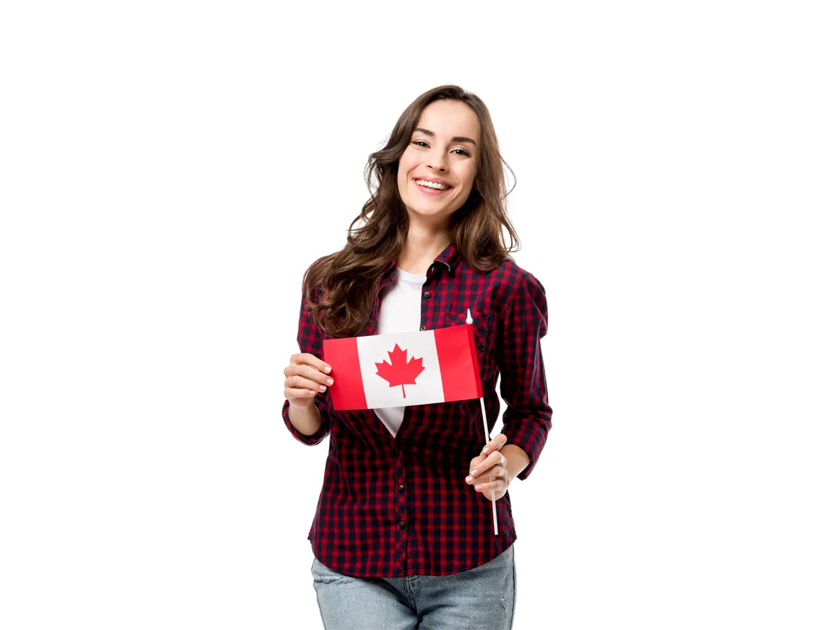 Applicant smiling with the Canadian flag after using free Canadian citizenship test practice.