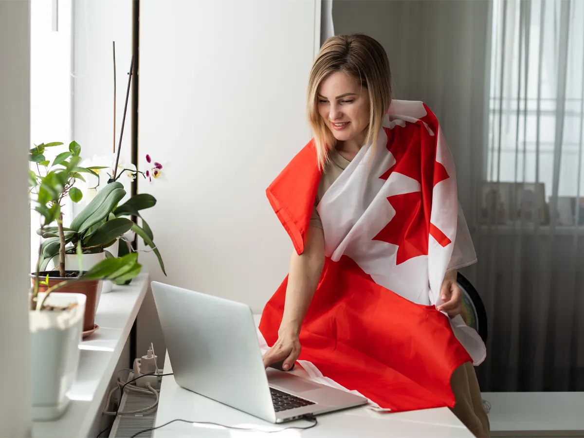Applicant checking Canadian citizenship status online on laptop