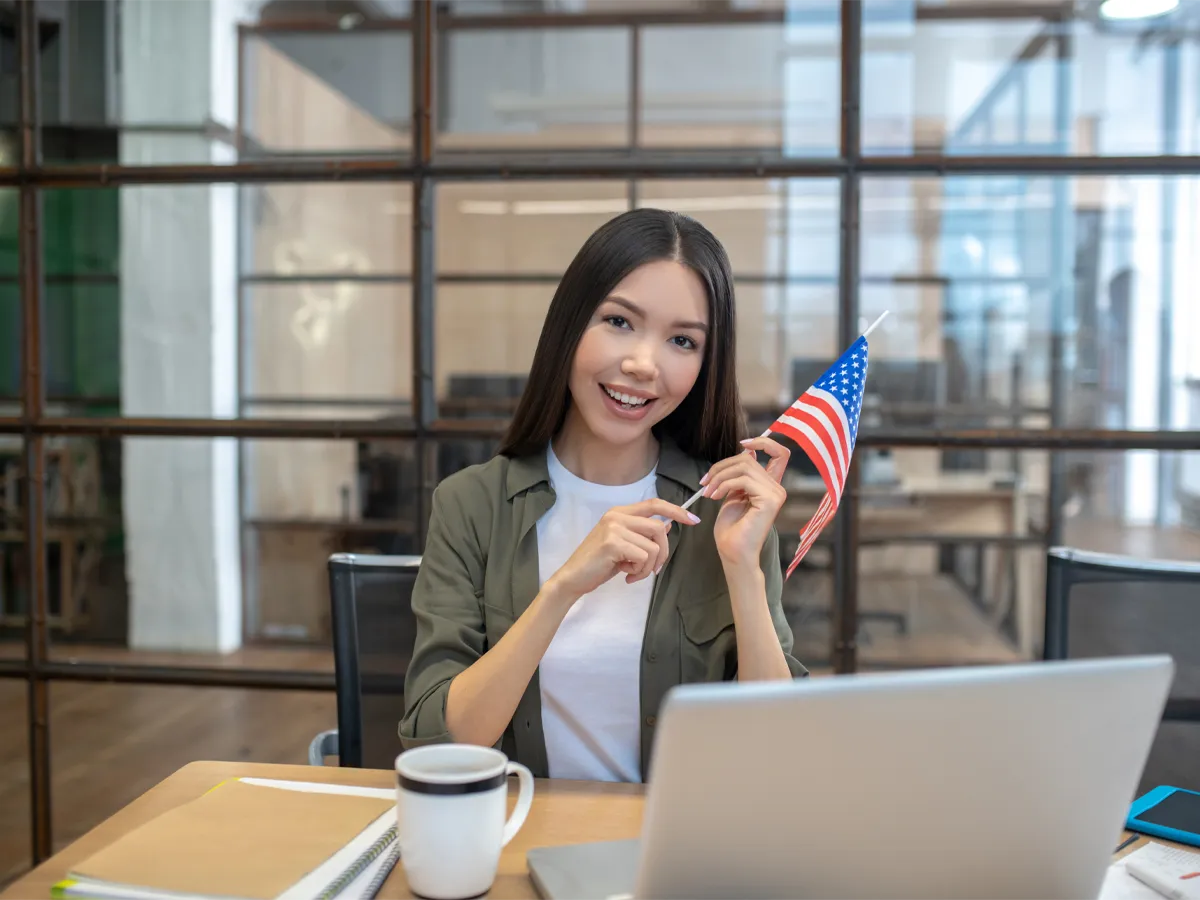 Applicant looking up what is a USCIS online account number on a laptop using myUSCIS
