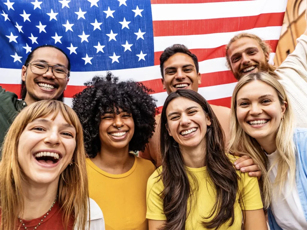 A group of happy new U.S. citizens cheering and celebrating their new rights and status